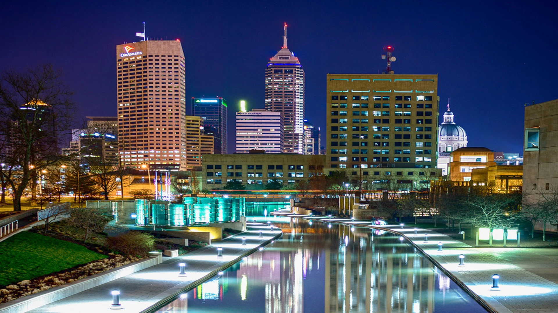 Indianapolis skyline with canal at night.